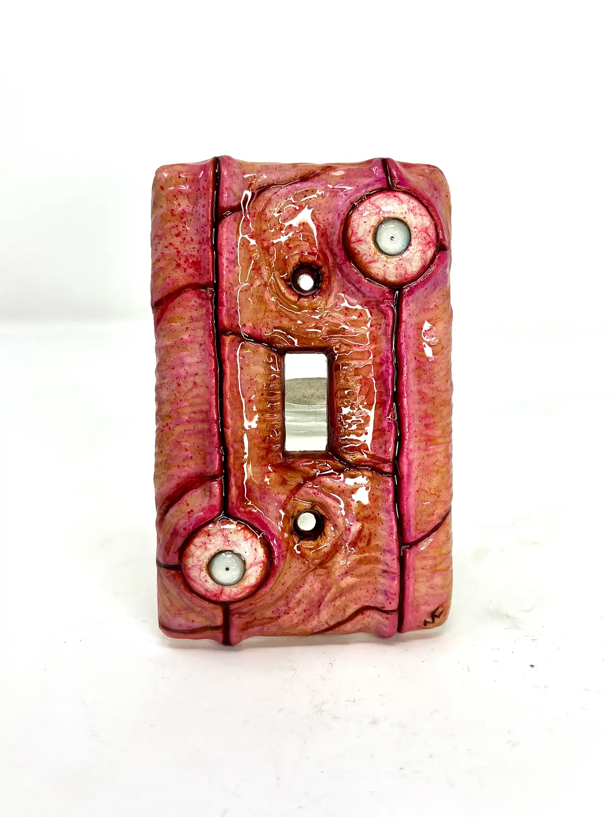 Cross Eye Switch Plate 1