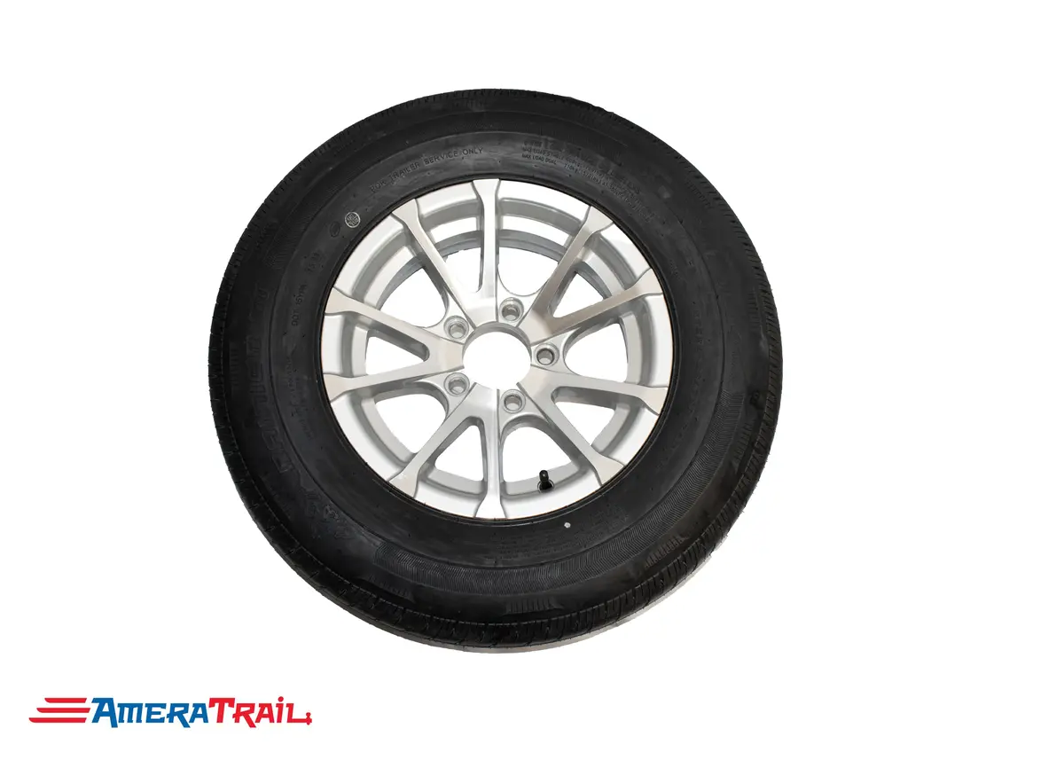205 / 75 R 14 Load Range C On 5 Lug Avalanche Silver Rim - Tire Brand May Vary. 1