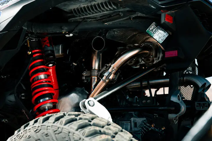 Trinity Racing Can-Am Maverick R Sidepiece Valved Head Pipe 1