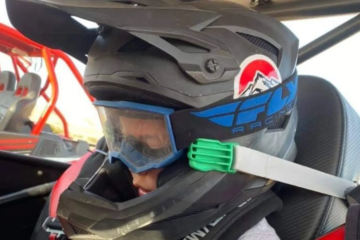 Helmet Hands - The Child Helmet Restraint Device 1