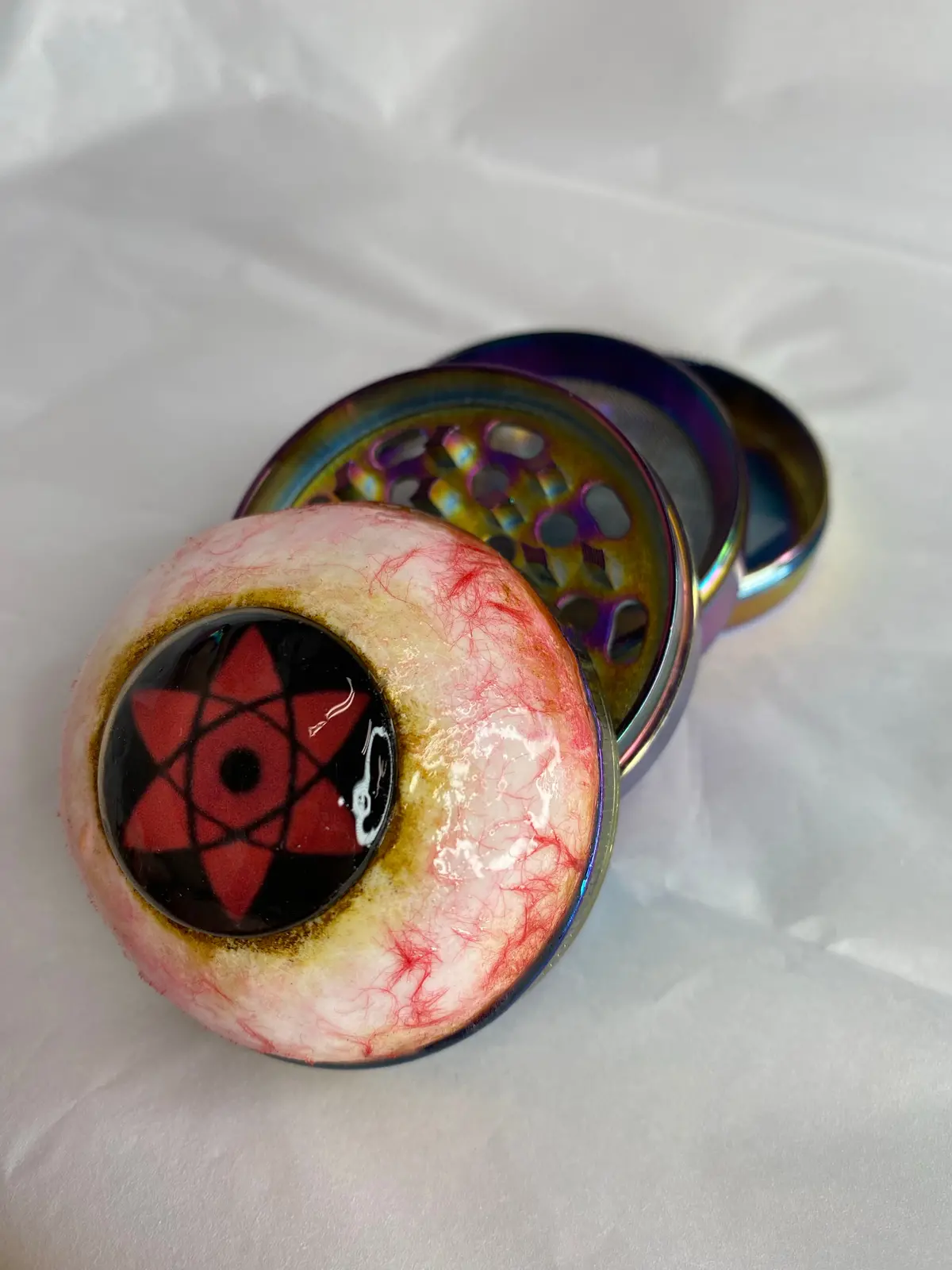 Sasuke Sharingan Grinder 1