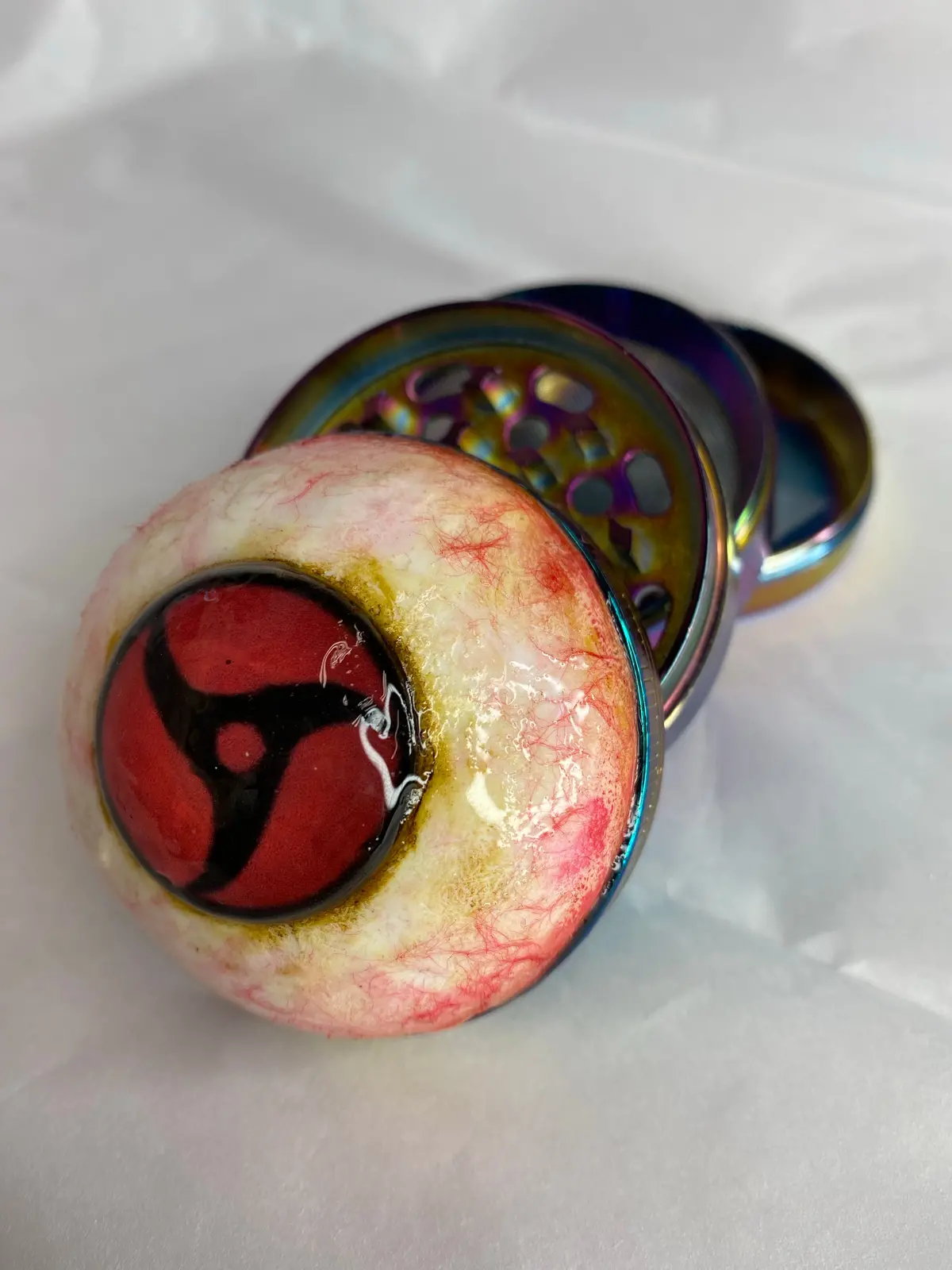 Itachi Sharingan Grinder 1