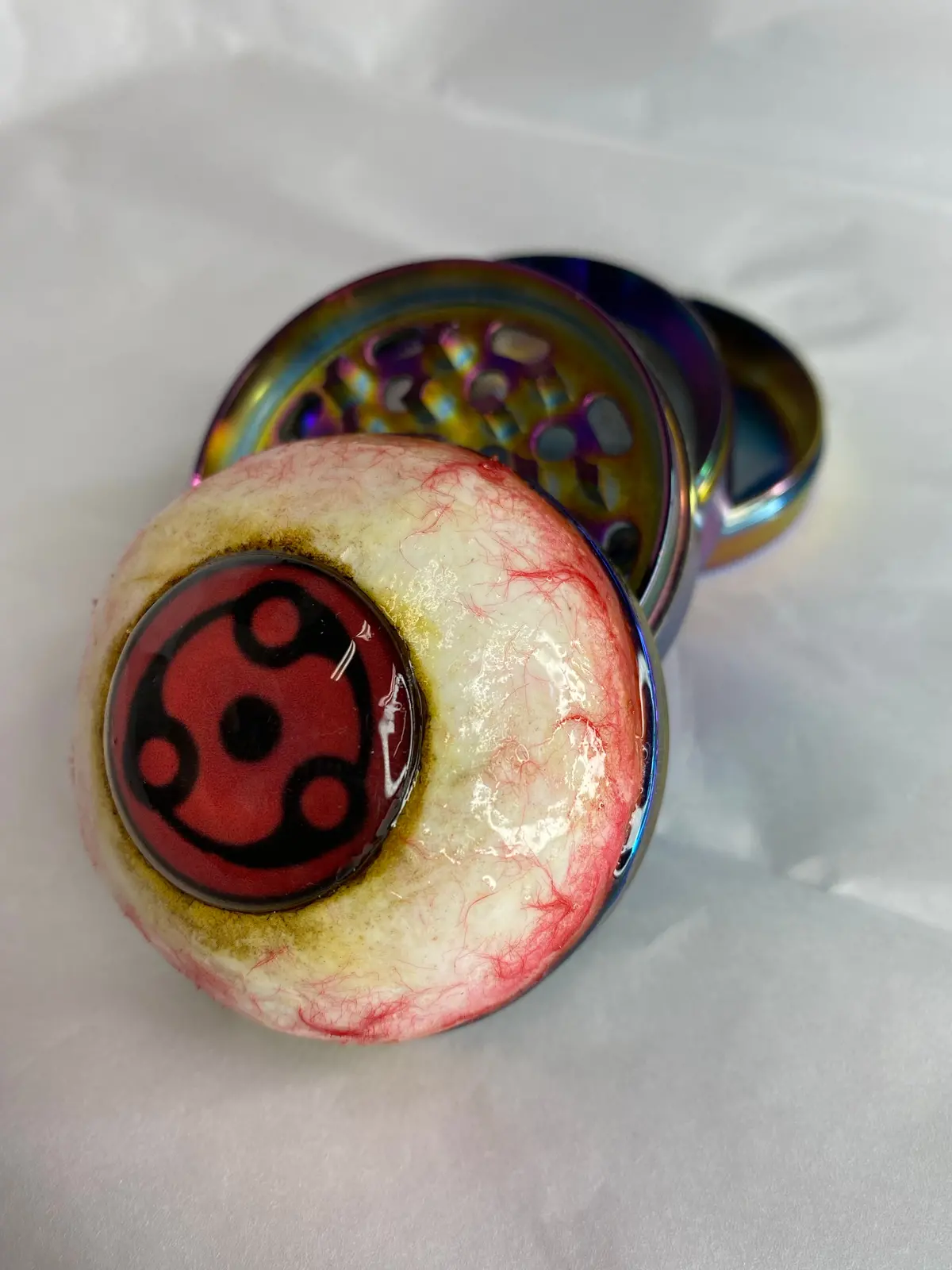 Madara Sharingan Grinder 1