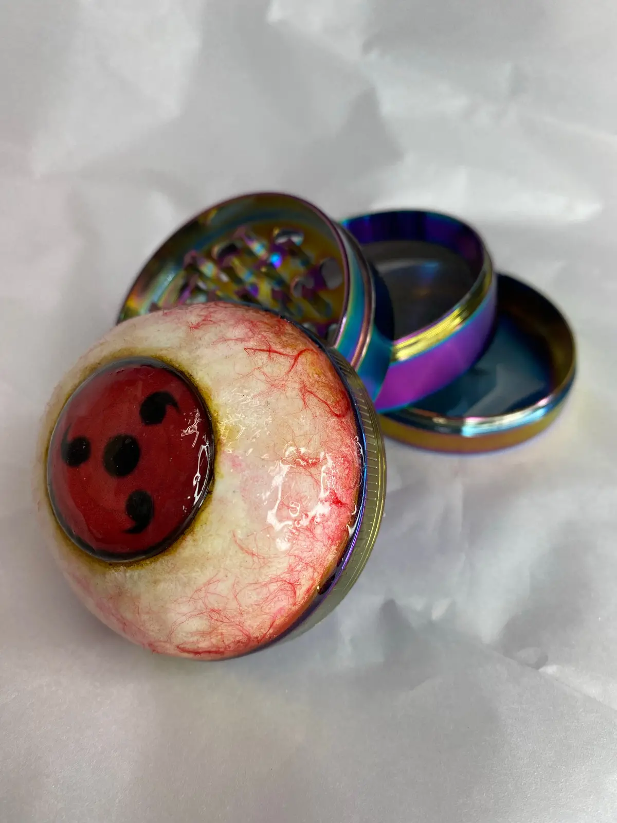 Triple Tomoe Sharingan Grinder 1